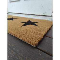 Drmtte med stjerne motiv af Kokos. Naturligt holdbar og forbliver pn.  Fs i flere strrelser