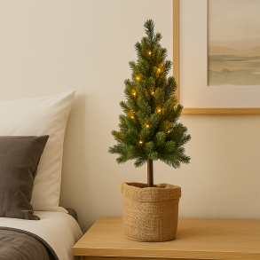 Juletr i jutepose med sne og LED lys