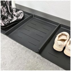 Skomatta med kant i svart plast. Skonar golvet frn smuts och vatten med en smart design med kant