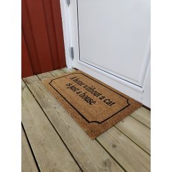 Drmtte med motiv "A home without a cat is just a house" - af slidstrkt kokos og gummi.