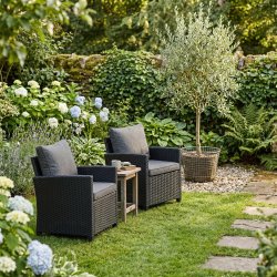 Seoul loungestol i sort UV-beskyttet polyrattan, inkl. all-weather hynder