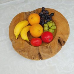 Bordskl i rustik teakrod. Ca. ml: Hjde: 10 cm. Diameter 40 cm. Meget flot som frugtskl med mere.