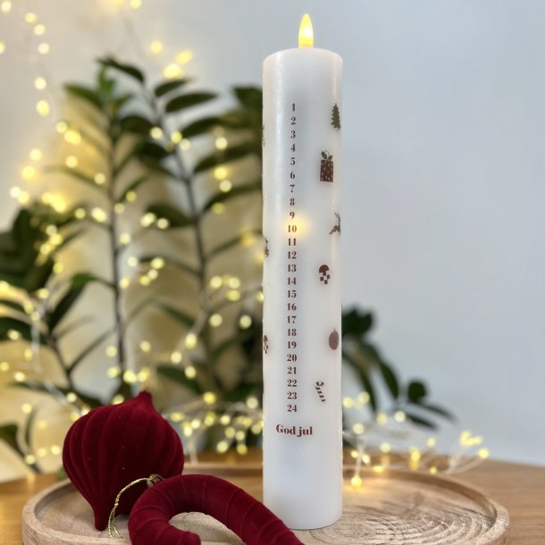 LED kalenderlys inkl. fjernbetjening med flotte julemotiver. Str. diameter � 5 cm. H�jde 27, 5 cm